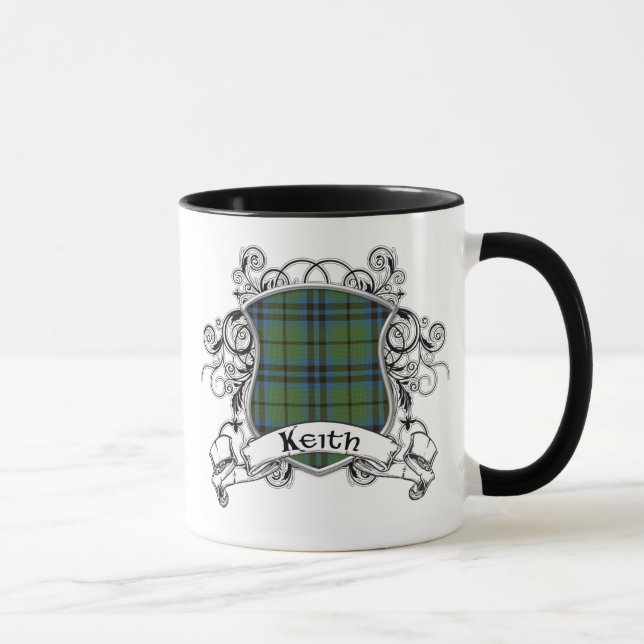 Den Keith tartanen skyddar Mugg (Höger)