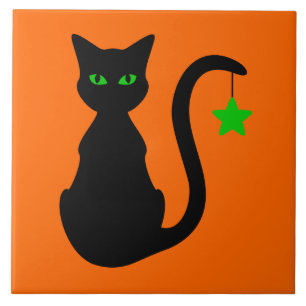 Den keramiska svart katten belägger med tegel kakelplatta