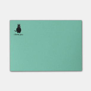 Den klibbiga katten postar det anteckningsboken post-it block