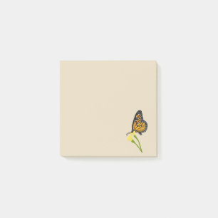 Den klibbiga monarkfjärilen noterar post-it block