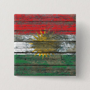 Den Kurdish flagga på grovt trä stiger ombord Knapp