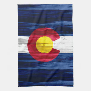 Den lantliga wood Colorado flagga räcker handduken Kökshandduk