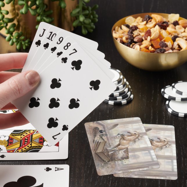 Den lärda hästen hoppar från en bok casinokort (På plats)