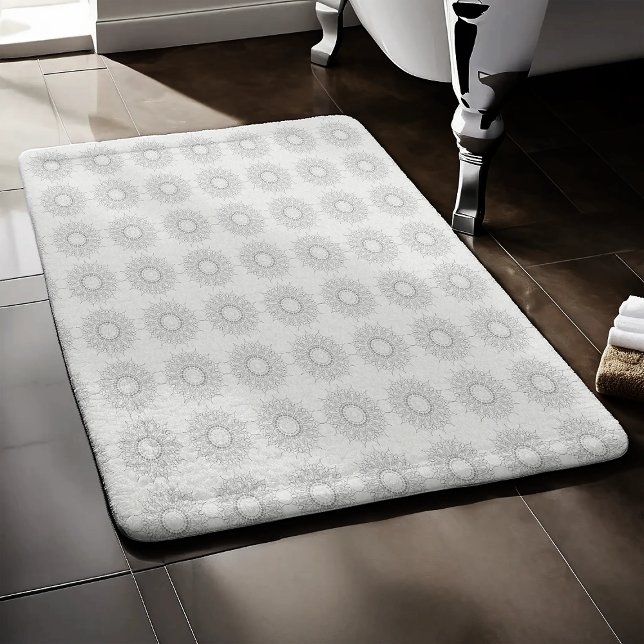 Den lilla vita blommigten sjönk till mönster på la badrumsmatta (Skapare uppladdad)