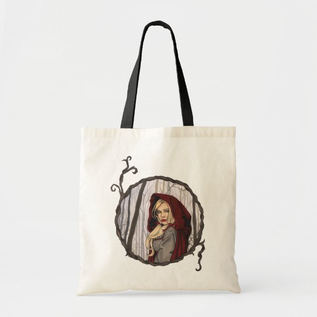 Den lite röda ridninghuvan hänger lös tygkasse (Framsidan)