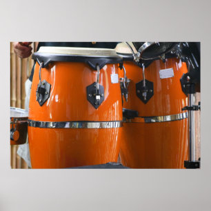 Den ljusa orange congaen trummar fotoet poster