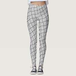 Den metade svarten & vit kläcker mönster leggings