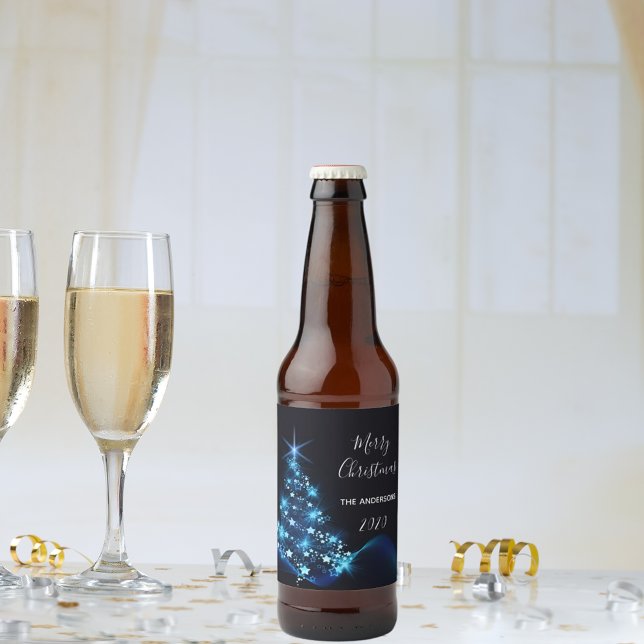 Den moderna skuggblått i party under jul träd ölflaska etikett (Skapare uppladdad)