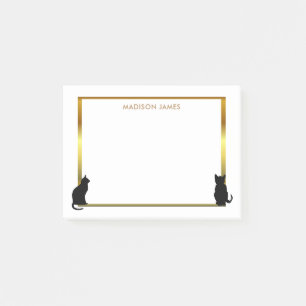 Den moderna svart katten silhouettes den guld- post-it block