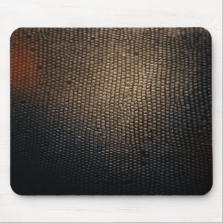 Den mörka lädernågot liknandemusen vadderar musmatta