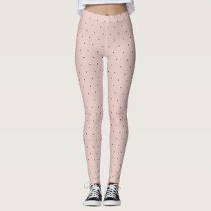 Den mycket små rosa och svart polkaen pricker leggings