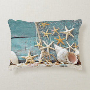 Den nautiska sjöstjärnan och fiskaren förtjäna prydnadskudde