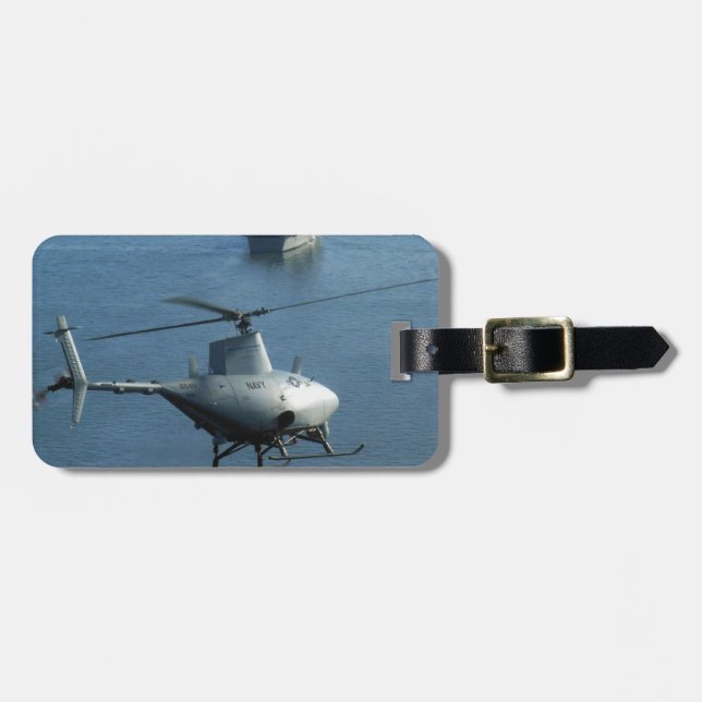 Den obemannade helikoptern avfyrar spanar bagagebricka (Horisontell Framsida)