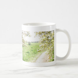 Den panorama- blommar ser en homuggen kaffemugg