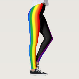 Den pastellfärgade regnbågen görar randig servi leggings