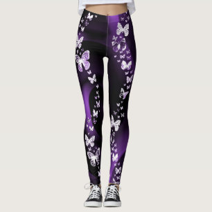 Den purpurfärgade fjärilen virvlar runt damasker leggings