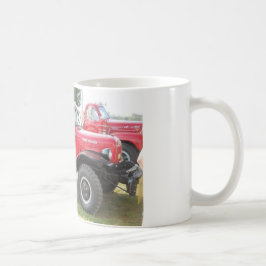 Den röda fint driver vagn kaffemugg