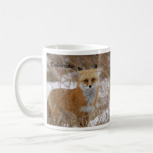 Den röda räven och spårar kaffemugg