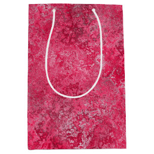 Den röda rosa gåvan hänger lös
