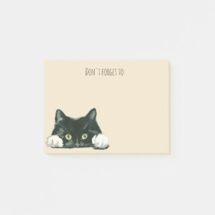 den roliga katten postar det noterar den svart post-it block