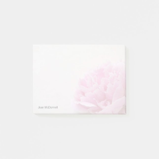 Den rosa pionen beskådar bleknar post-it block (Framsida)