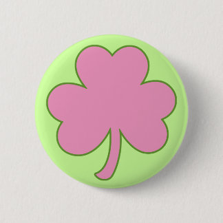 Den rosa shamrocken knäppas knapp