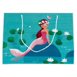 Den rosa sjöjungfrugåvan hänger lös