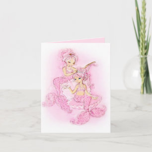 Den rosa sjöjungfrumaid of honor noterar kortet inbjudan