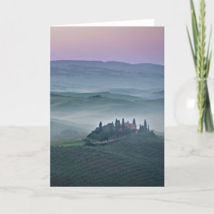 Den rosa soluppgången över Tuscany landskap Kort