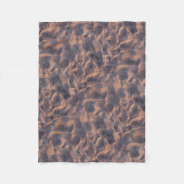 Den sandiga stranden strukturerar fotoet fleecefilt