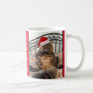 Den Santa katten får mjölk och kakajulmuggen Kaffemugg