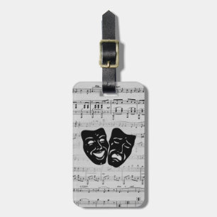 Den silvermusik och teatern maskerar bagagebricka