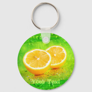 Den skivat citronen och vatten tappar Keychain Nyckelring