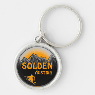Den Solden Österrike orangen skidar konstkeychain Rund Silverfärgad Nyckelring