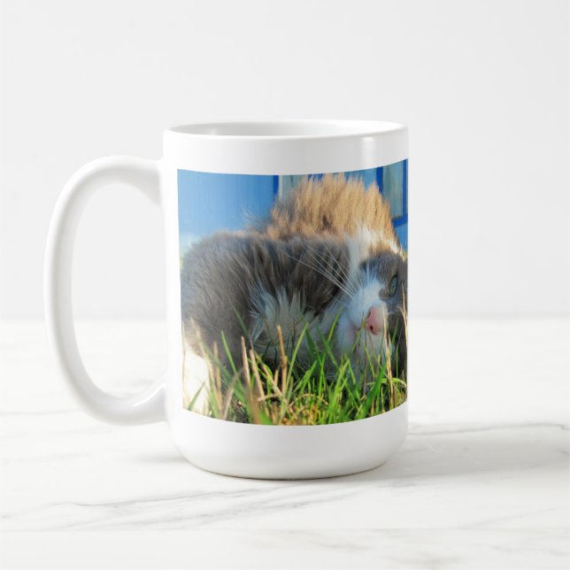 Den soliga katten är solig kaffemugg (Vänster)