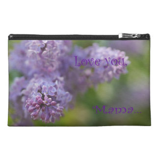 Den soliga lilan hänger lös för mamma resenecessär