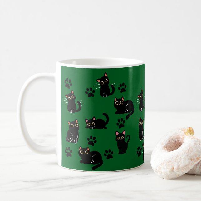 Den söta svarta kattmuggen är en perfekt present f kaffemugg (Med munk)