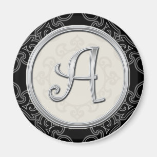 Den stilfulla silvermonogramen märka med sina magnet