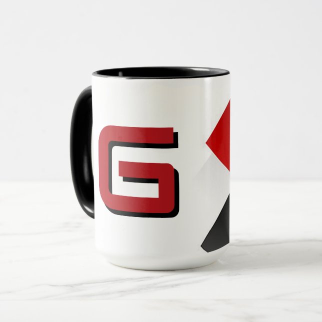 Den STORA “G” Kombomugen Mugg (Framsida vänster)