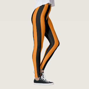 Den stora orangesvarten görar randig Halloween Leggings