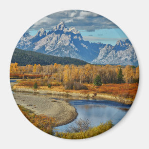 Den storslagna Teton bergfloden beskådar i höst Magnet