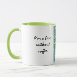 Den svart björnen i bär lappar mugg