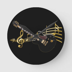 Den svart gitarr- och musikställningväggen tar t rund klocka