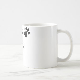 den svart gulliga hunden tafsar vovve kaffemugg