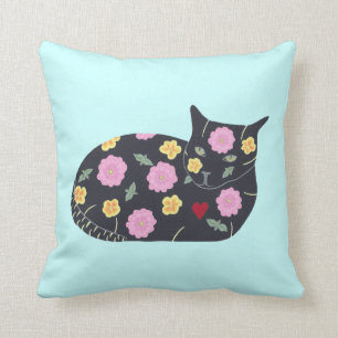 Den svart katten blommar växter som katter kan ä kudde