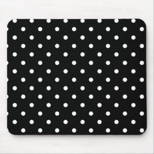 den svart polkaen pricker musmatta
