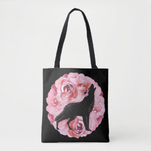 Den svart vargen med rosa rostoto hänger lös tygkasse