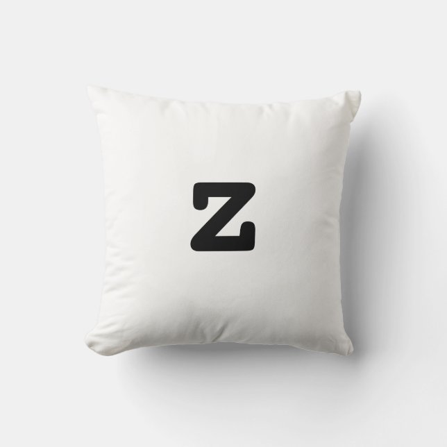 Den svartvita anagramen kudder litet brev z kudde (Framsida)