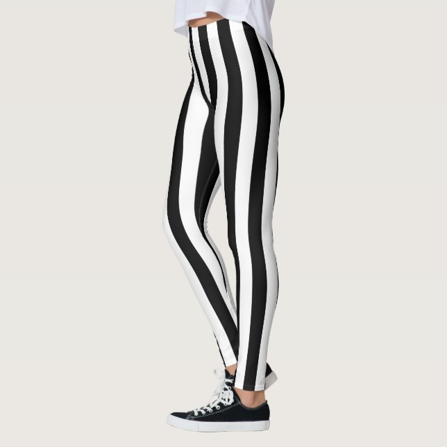 Den svartvita lodrät görar randig dekoren på leggings (Vänster)