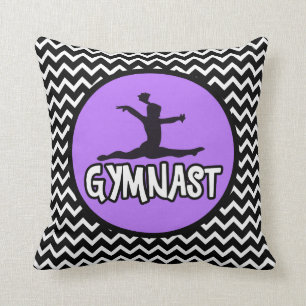 Den svartvita sparren med purpurfärgad gymnast kudde